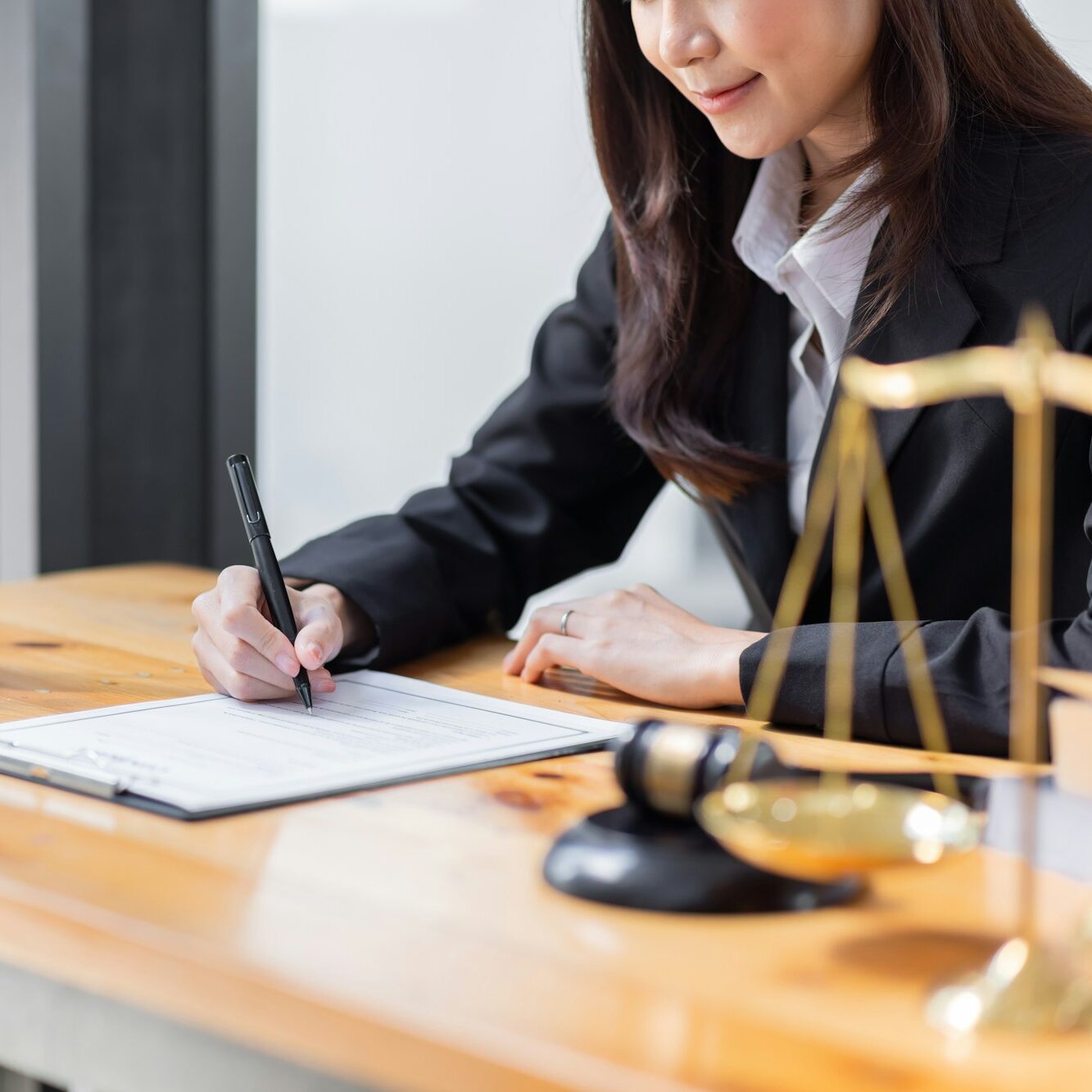 female business woman lawyers working at the law firms. Judge gavel with scales of justice. Legal