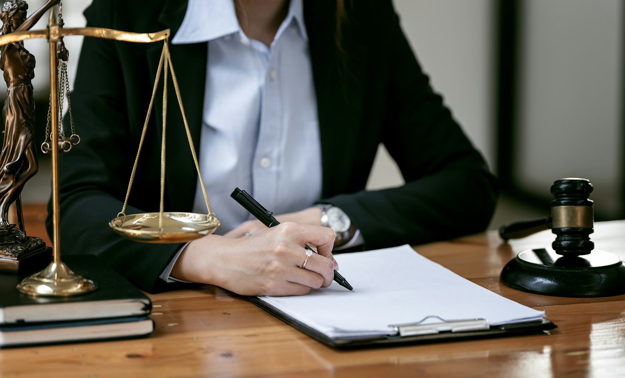 Justice lawyers, Businesswoman in suit or lawyer working on a documents.